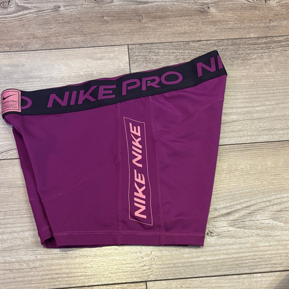 Nike Women's Magenta Athletic Shorts - Picture 5 of 5